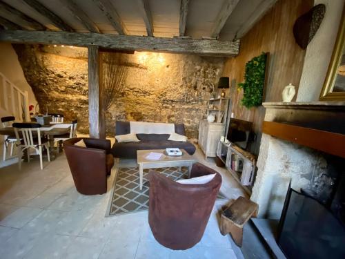 Posezení v ubytování Maison troglodyte aux Eyzies Périgord