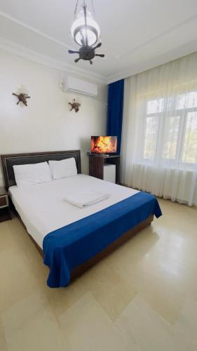 Postel nebo postele na pokoji v ubytování Turabdin Hotel