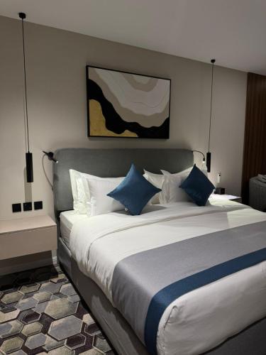 Katil atau katil-katil dalam bilik di Continent Al Waha Hotel Riyad