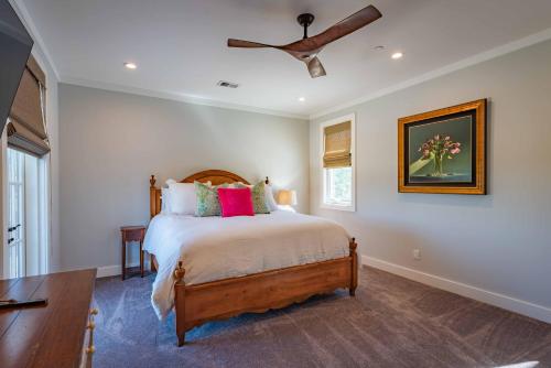 a bedroom with a bed and a ceiling fan at Bella Vita in Paso Robles