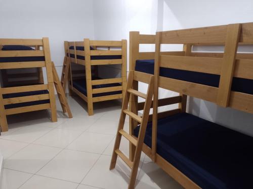 Μία ή περισσότερες κουκέτες σε δωμάτιο στο Casa Abençoada - Aparecida SP