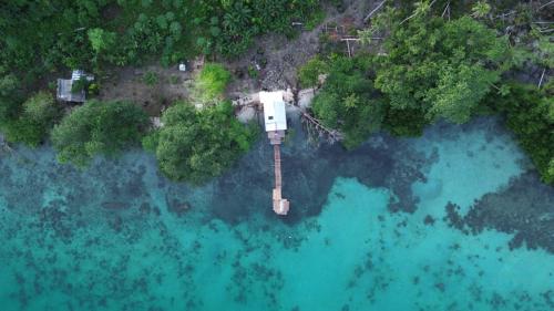 an aerial view of a small island in a body of water at Midemide Island Ecolodge 