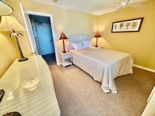 a bedroom with a bed and a hammock in it at The crest 403 in Rehoboth Beach