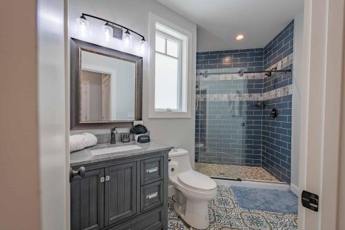 a bathroom with a toilet and a sink and a shower at Bella Vita in Paso Robles