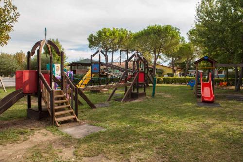 a group of playground equipment in a park at Mobilehomes in Sirmione - Gardasee 22177 in Sirmione