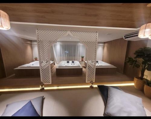 a rendering of a bathroom with a tub and a sink at Art Studio - Apartamento em frente ao mar in Salvador