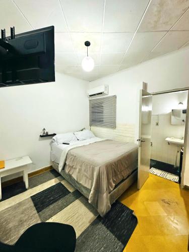 Una cama o camas en una habitación de Apartamento Entero
