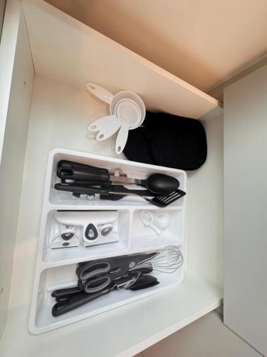 a drawer filled with lots of kitchen utensils at RED Mountain Suite in Rossland