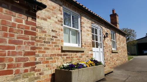 A patio or other outdoor area at Watermill Farm Cottages