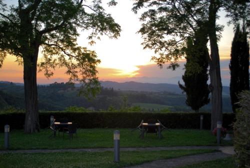 a view of the sunset from the garden of a house at Borgo La Casaccia in Montaione