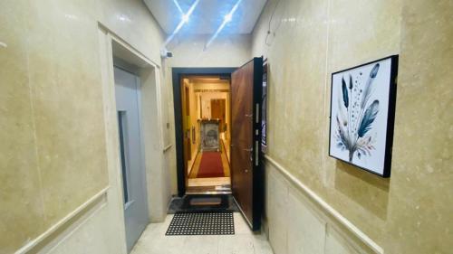 a hallway with a hallway leading to a room at Golden Season Hotel in Cairo