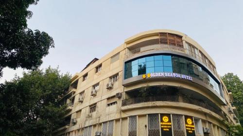 a building with a round window on top of it at Golden Season Hotel in Cairo