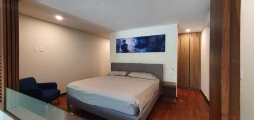 En eller flere senge i et værelse på Awa C-103