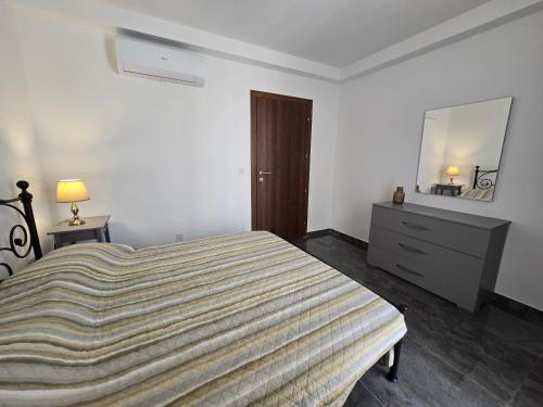 Katil atau katil-katil dalam bilik di Serenity Suites No 5