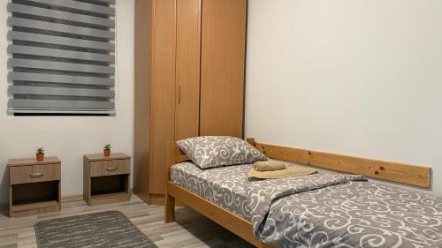 Postel nebo postele na pokoji v ubytování Vikendica Cerović