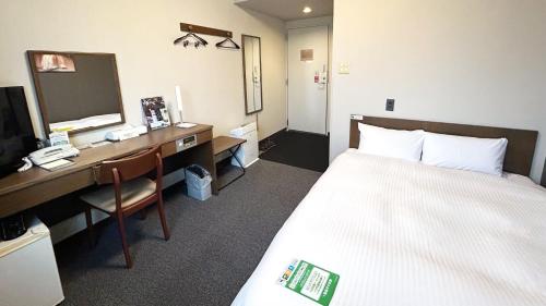 Katil atau katil-katil dalam bilik di Hotel Route-Inn Myoko Arai