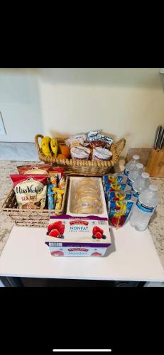 a table with a bowl of food and a basket of food at BV Guest House With Pool And Spa in Rancho Cucamonga