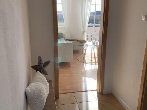a view of a living room with a starfish on the floor at 1-bedroom holiday apartment in Hasselberg