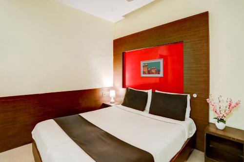 Postel nebo postele na pokoji v ubytování Hotel O GN International