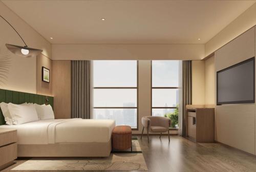 Katil atau katil-katil dalam bilik di Hilton Garden Inn Linyi Shangcheng