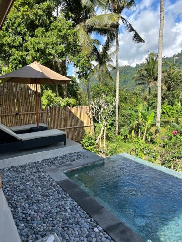 Piscina en o cerca de Dewi Teduh Villa