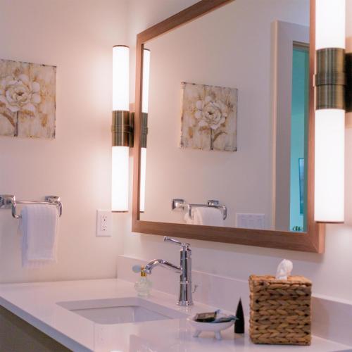 a bathroom with a sink and a mirror at Sea Palms Resort St Simons Island in Saint Simons Island
