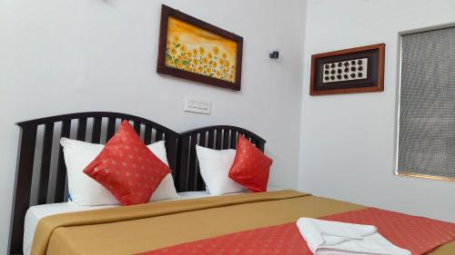 Postel nebo postele na pokoji v ubytování Ashirvad Homes