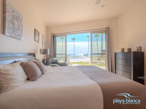 Ένα ή περισσότερα κρεβάτια σε δωμάτιο στο Playa Blanca Premier Unit 108