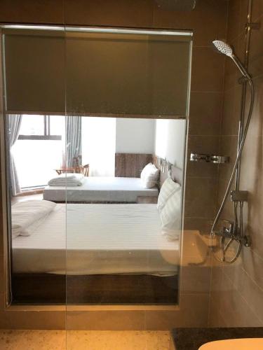 Ένα μπάνιο στο APEC Mandala Chăm Bay Mũi Né Luxury by LTĐ