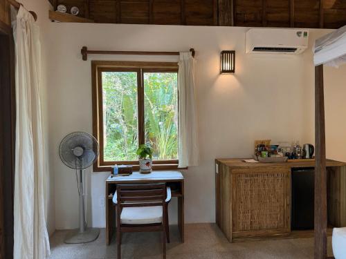 Kuchyň nebo kuchyňský kout v ubytování Mango Bay Resort
