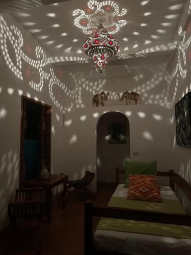 Кровать или кровати в номере Casbah De Oro Guest and Transient House