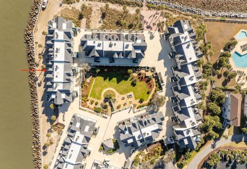 an aerial view of a white estate with houses at 630 New Haven - Dolphin Pointe in Fripp Island
