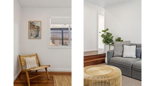 a living room with a couch and a table at Zephyr - Modern Coastal Beach Shack in Yamba