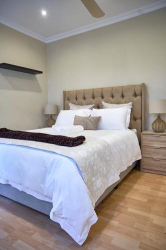 Ein Bett oder Betten in einem Zimmer der Unterkunft WinOne on 4 Chantecler