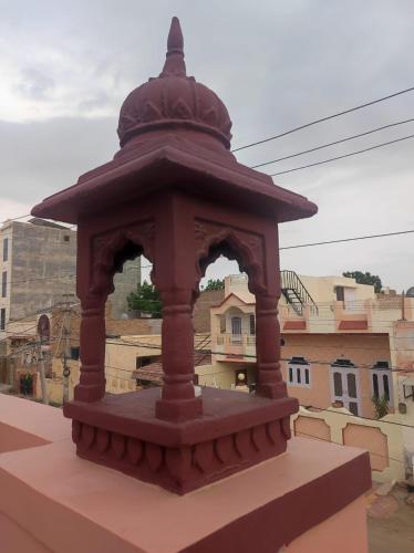 a brown object sitting on top of a building at Ardas Villa Bikaner - Heritage Luxury Boutique Stay in Bikaner