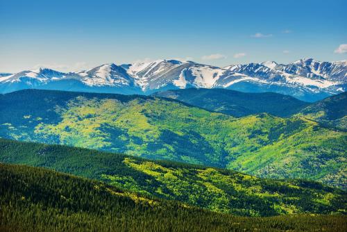 a view of a mountain range with snow covered mountains at 4429 Beaver Run Resort in Breckenridge