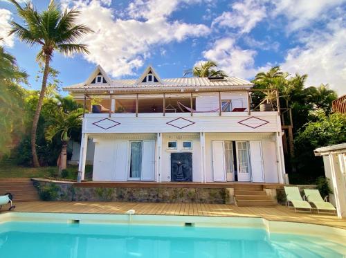 Piscina a Villa Blue Waves o a prop
