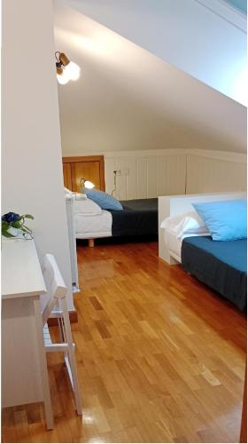 Ένα ή περισσότερα κρεβάτια σε δωμάτιο στο alaia apartamento