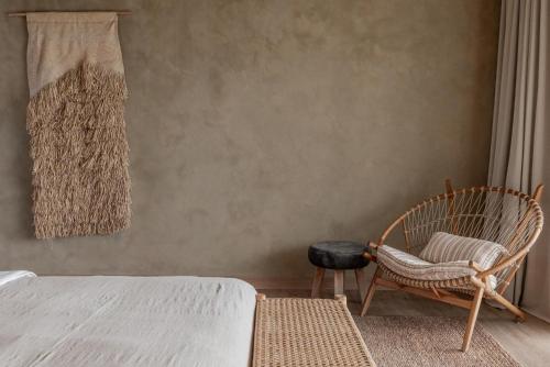 Postel nebo postele na pokoji v ubytování BI Design House