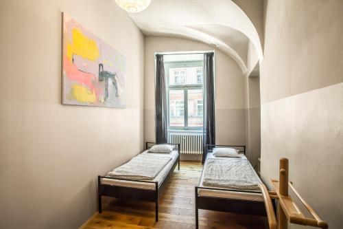 Llit o llits en una habitació de Ahoy! Hostel