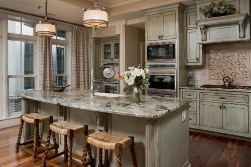 a kitchen with a large island with a marble counter top at River View 3 Bedroom Wilson Village Home 70 in Bluffton