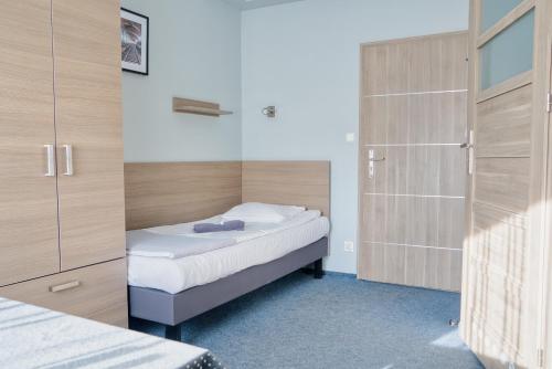 Posteľ alebo postele v izbe v ubytovaní Hostel Azymut