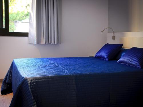Кровать или кровати в номере Hotel Salomé