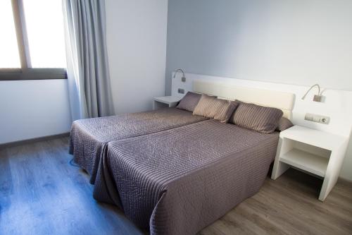 Кровать или кровати в номере Hotel Salomé