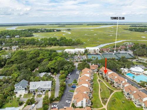 an aerial view of a resort with a tennis club at 124 Capt John Fripp Villa in Fripp Island