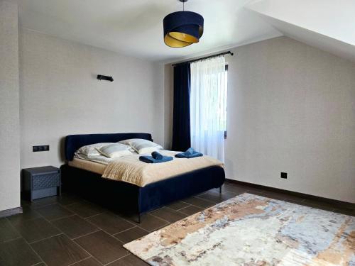 Katil atau katil-katil dalam bilik di Apartamenty Mazurskie Ługowscy