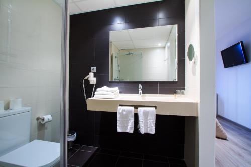 Ванная комната в Hotel Salomé