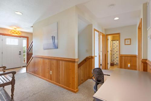 a dining room with a table and chairs at 8650 - Mare Vista Retreat in Frisco