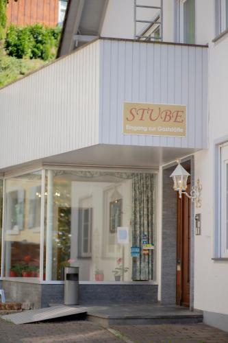 a store front of a building with a sign on it at Stube Hotel und Gasthaus in Nordrach