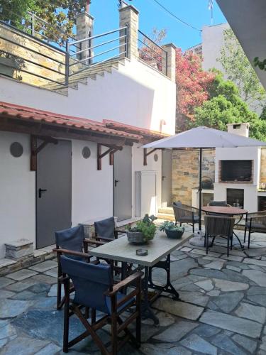 Gallery image of Menexe Apartments-Kelyfos in Neos Marmaras